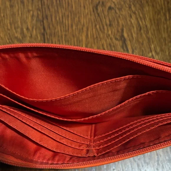 Coach Orange Leather Wristlet with Pink Charm and Brown Strap - Picture 3 of 3